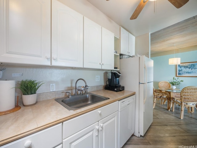 87-561 Farrington Hwy Unit 315, Waianae, HI 96792 - kitchen featuring a ceiling fan, white appliances, white cabinets, and a sink