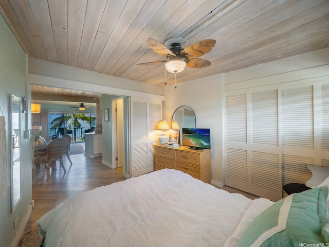 87-561 Farrington Hwy Unit 315, Waianae, HI 96792 - bedroom with wood ceiling, a ceiling fan, light wood finished floors, and baseboards