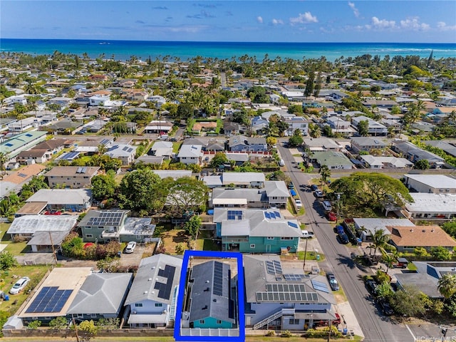 aerial view with a residential view and a water view