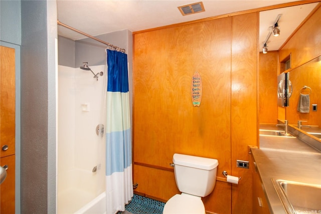 full bathroom with toilet, visible vents, shower / bathtub combination with curtain, and vanity