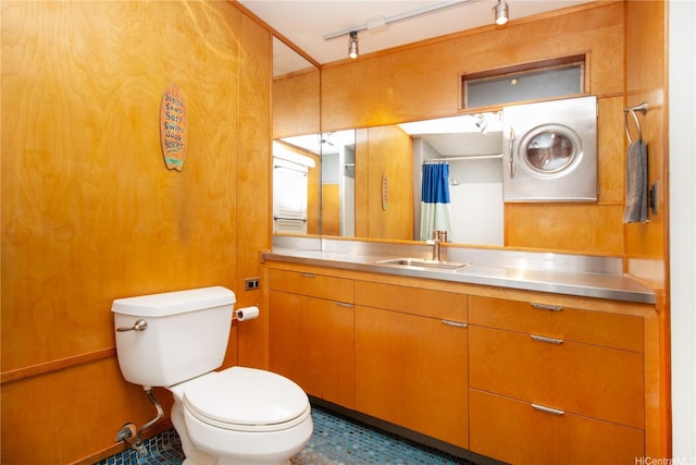 bathroom with vanity, tile patterned floors, and toilet