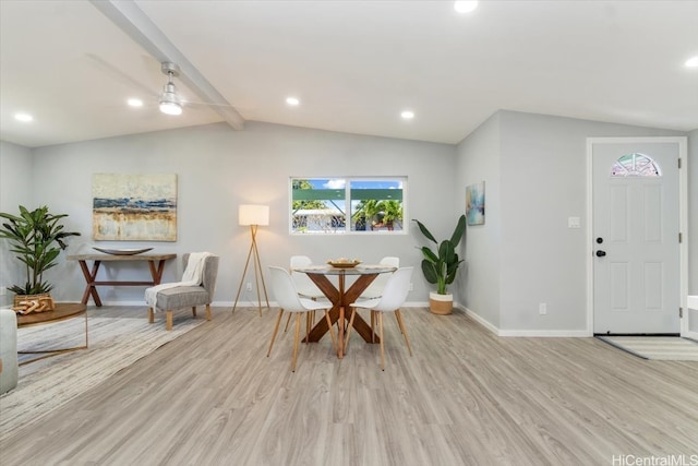 dining area featuring wood finished floors, recessed lighting, vaulted ceiling with beams, and baseboards