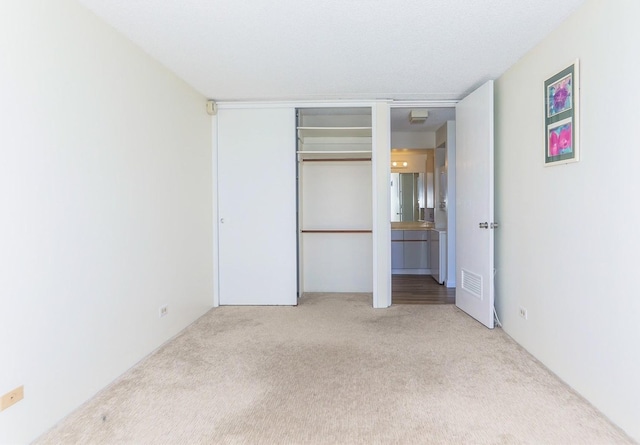 411 Hobron Ln Unit 1710, Honolulu, HI 96813 - unfurnished bedroom with carpet floors and a closet