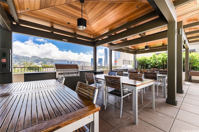 1009 Kapiolani Blvd Ph 4802, Honolulu, HI 96814 - view of patio / terrace with area for grilling, a ceiling fan, and outdoor dining area