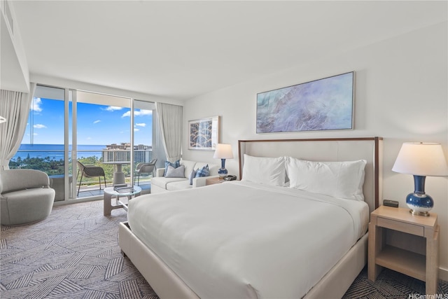 383 Kalaimoku St Unit 1906, Honolulu, HI 96815 - bedroom with floor to ceiling windows, a water view, and access to outside