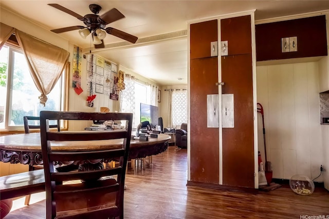 94-941 Awanei St, Waipahu, HI 96797 - dining space featuring wood finished floors, a ceiling fan, and crown molding