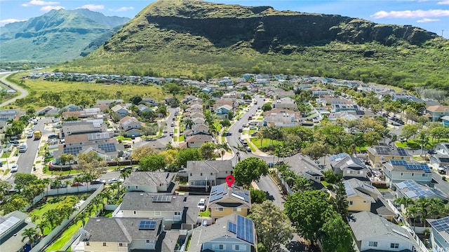 birds eye view of property featuring a mountain view and a residential view