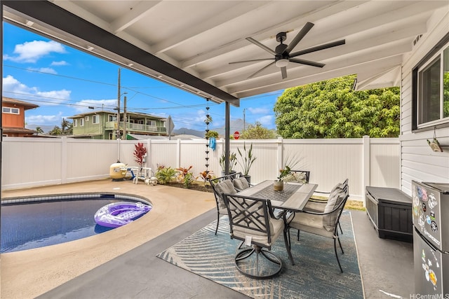 552 Kalolina St, Kailua, HI 96734 - view of patio / terrace with a fenced backyard, a ceiling fan, a fenced in pool, and outdoor dining area