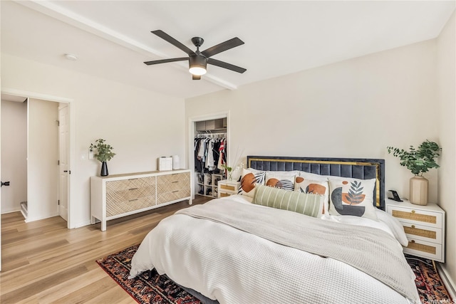 552 Kalolina St, Kailua, HI 96734 - bedroom with a closet, baseboards, ceiling fan, and wood finished floors