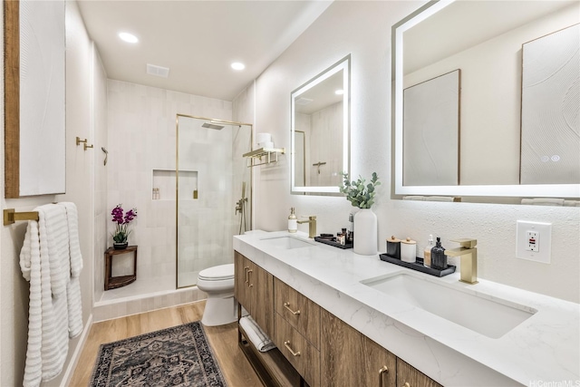 552 Kalolina St, Kailua, HI 96734 - bathroom featuring a sink, wood finished floors, and a stall shower