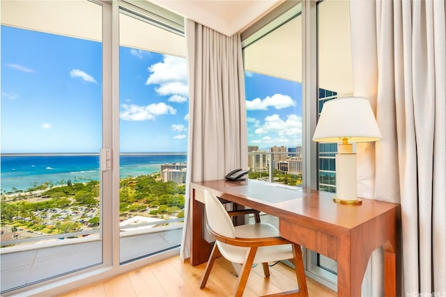 2139 Kuhio Ave Fl 34Th, Honolulu, HI 96815 - interior space with a water view and wood finished floors