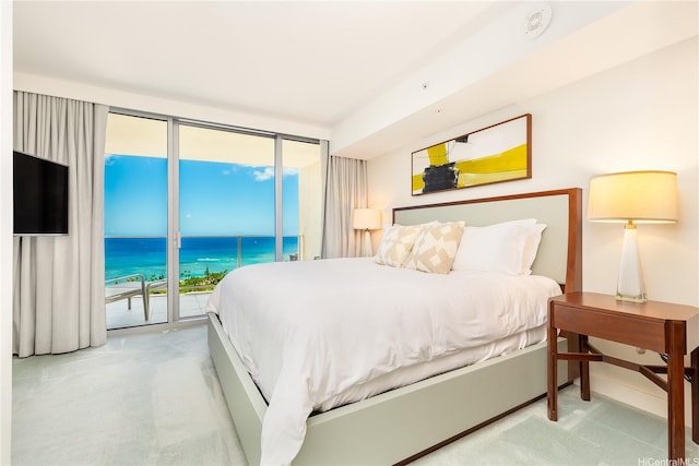 2139 Kuhio Ave Fl 34Th, Honolulu, HI 96815 - carpeted bedroom with a water view and access to exterior