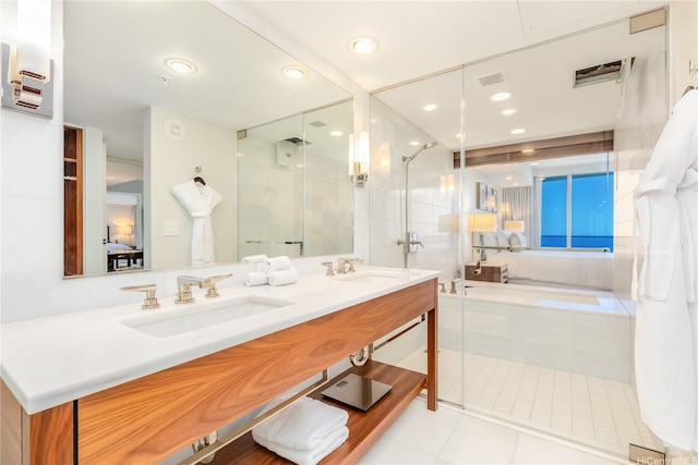 2139 Kuhio Ave Fl 34Th, Honolulu, HI 96815 - bathroom featuring visible vents, double vanity, ensuite bathroom, a shower stall, and a sink