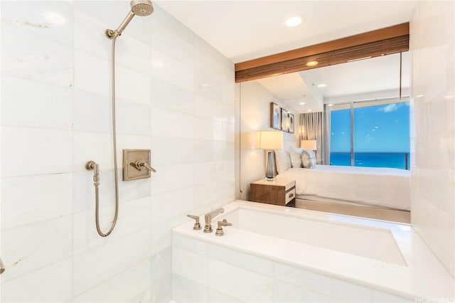 2139 Kuhio Ave Fl 34Th, Honolulu, HI 96815 - ensuite bathroom featuring tile walls, tiled shower, recessed lighting, connected bathroom, and a bath