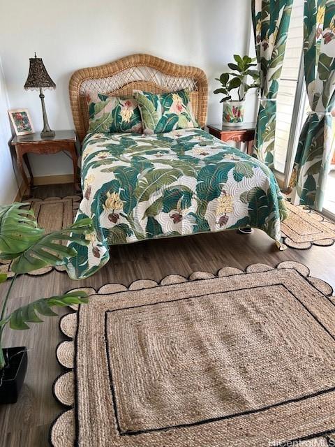 1620 Keeaumoku St Unit 404, Honolulu, HI 96822 - bedroom with wood finished floors