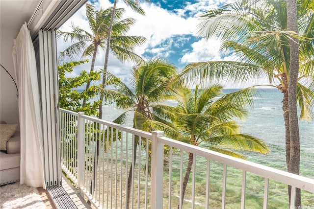 balcony featuring a water view