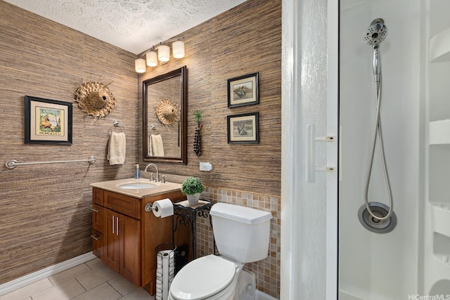 2452 Tusitala St Unit 908, Honolulu, HI 96815 - full bathroom with tile patterned flooring, vanity, toilet, a textured ceiling, and a shower
