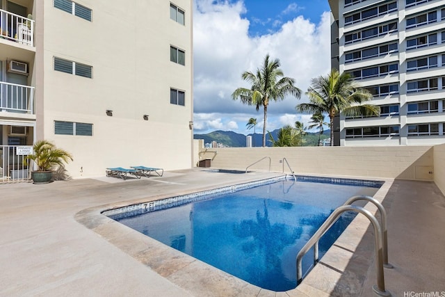 2452 Tusitala St Unit 908, Honolulu, HI 96815 - pool with a patio, a mountain view, and fence