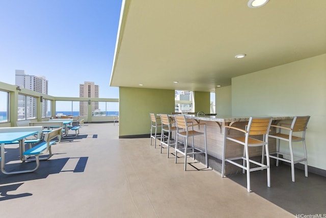 2452 Tusitala St Unit 908, Honolulu, HI 96815 - view of patio / terrace with a city view and outdoor dry bar