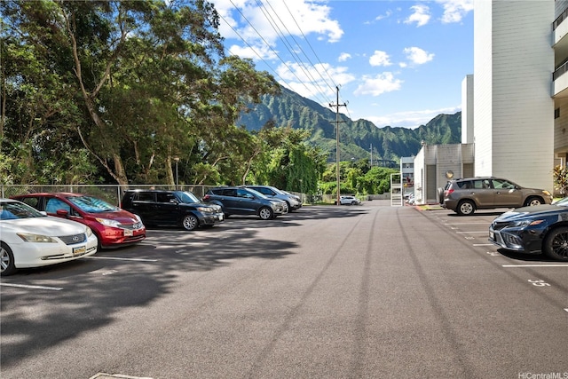 46-270 Kahuhipa St Unit A419, Kaneohe, HI 96744 - uncovered parking lot with a mountain view