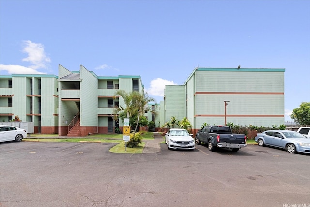 1045 Aheahe Ave Unit 315, Wahiawa, HI 96786 - view of building exterior with uncovered parking