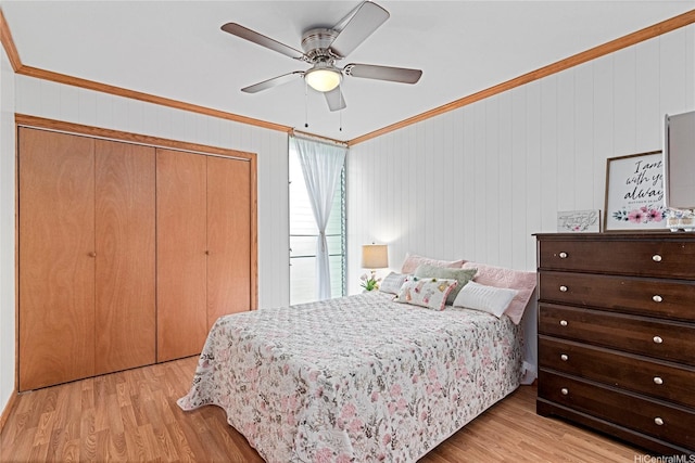 1045 Aheahe Ave Unit 315, Wahiawa, HI 96786 - bedroom with ornamental molding, ceiling fan, light wood-style floors, and a closet
