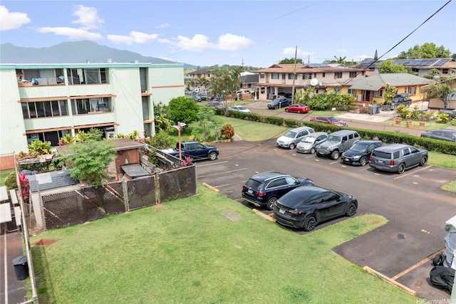 1045 Aheahe Ave Unit 315, Wahiawa, HI 96786 - uncovered parking lot featuring a residential view