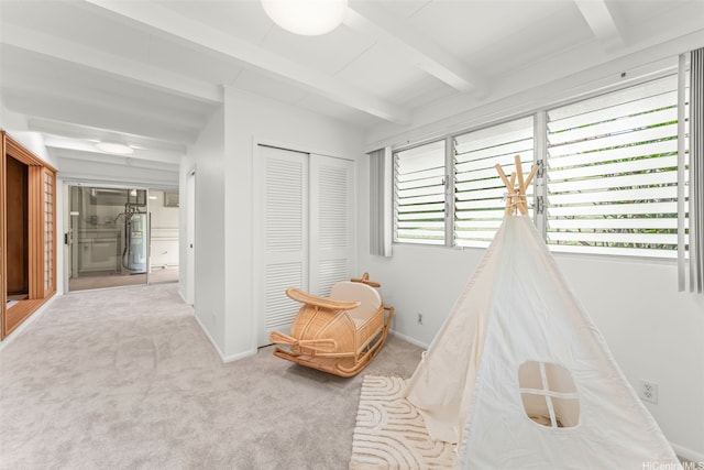 99-588 Auhau Pl, Aiea, HI 96701 - game room featuring water heater, beam ceiling, carpet flooring, and baseboards