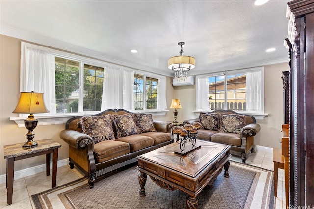 living area featuring baseboards, recessed lighting, and crown molding