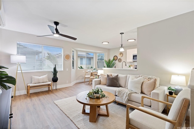 91-1860 Luahoana St Unit 114, Ewa Beach, HI 96706 - living area featuring baseboards, a ceiling fan, light wood finished floors, and recessed lighting