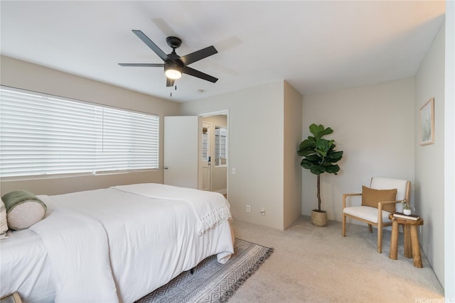 91-1860 Luahoana St Unit 114, Ewa Beach, HI 96706 - bedroom with light colored carpet and ceiling fan