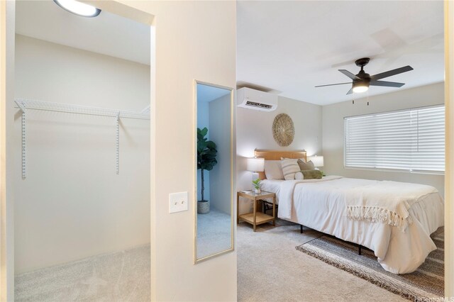 91-1860 Luahoana St Unit 114, Ewa Beach, HI 96706 - bedroom with a wall mounted air conditioner, carpet flooring, and ceiling fan