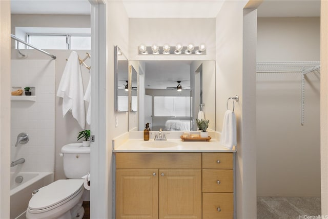 91-1860 Luahoana St Unit 114, Ewa Beach, HI 96706 - bathroom featuring vanity, ceiling fan, toilet, shower / washtub combination, and ensuite bath