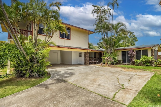 363 Ilimalia Loop, Kailua, HI 96734 - view of front of home with driveway, a carport, and stone siding