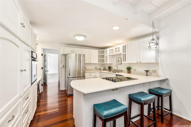 363 Ilimalia Loop, Kailua, HI 96734 - kitchen featuring appliances with stainless steel finishes, a sink, a peninsula, dark wood-style floors, and recessed lighting
