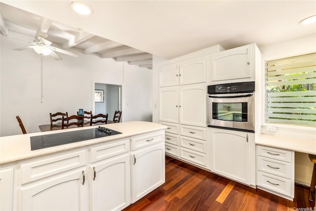 363 Ilimalia Loop, Kailua, HI 96734 - kitchen with stainless steel oven, black electric stovetop, ceiling fan, white cabinets, and dark wood-style flooring