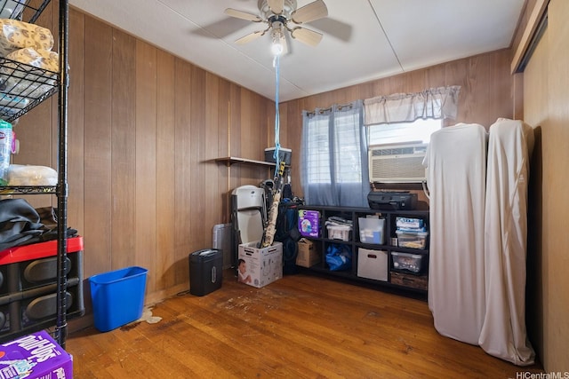 storage room featuring cooling unit and a ceiling fan