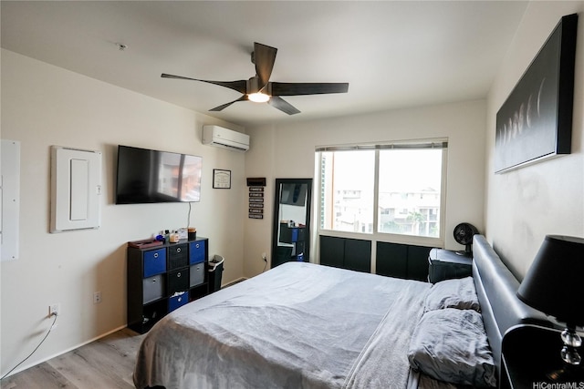 91-3633 Kauluakoko St Unit 5204, Ewa Beach, HI 96706 - bedroom featuring baseboards, ceiling fan, a wall unit AC, and wood finished floors