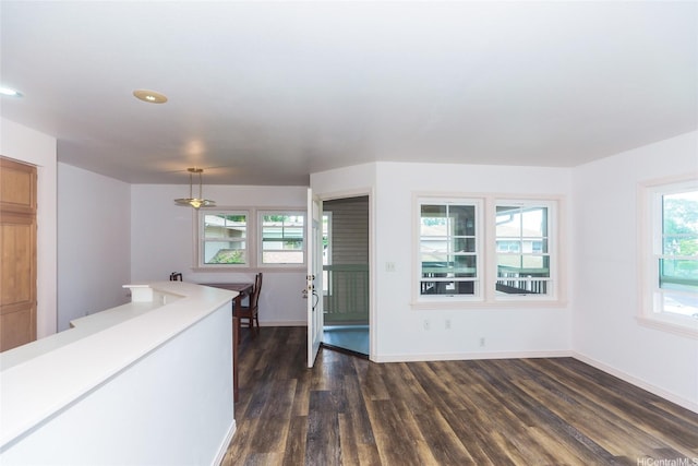 95-1491AINAMAKUADR Ainamakua Dr Unit 5, Mililani, HI 96789 - interior space with dark wood-style floors, recessed lighting, light countertops, and baseboards