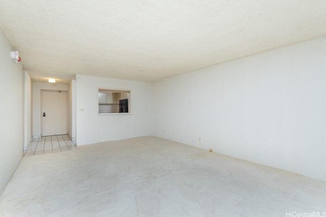 1600 Ala Moana Blvd Unit 1406, Honolulu, HI 96815 - unfurnished room with carpet and a textured ceiling