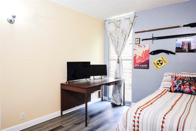 95-273 Waikalani Dr Unit D501, Mililani, HI 96789 - bedroom with wood finished floors, a textured ceiling, and baseboards