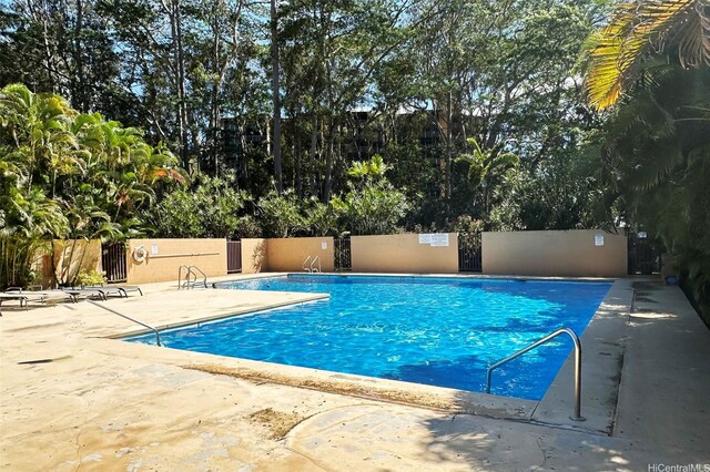 95-273 Waikalani Dr Unit D501, Mililani, HI 96789 - community pool featuring a patio area