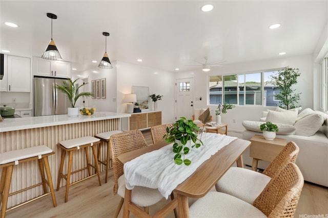 45-127 Waikapoki Rd Unit D, Kaneohe, HI 96744 - dining space featuring light wood-style flooring, a ceiling fan, and recessed lighting