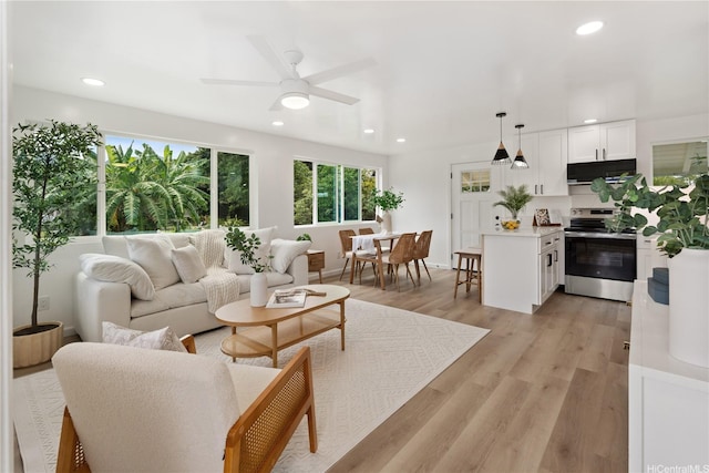 45-127 Waikapoki Rd Unit D, Kaneohe, HI 96744 - living area with recessed lighting, light wood-style flooring, and a ceiling fan