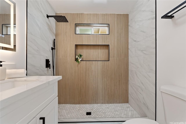 45-127 Waikapoki Rd Unit D, Kaneohe, HI 96744 - full bathroom with toilet, a stall shower, vanity, and tile walls