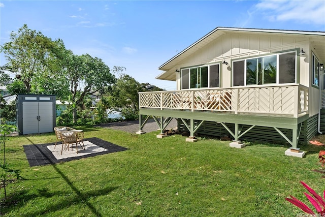 45-127 Waikapoki Rd Unit D, Kaneohe, HI 96744 - rear view of property with a yard, a deck, board and batten siding, and a patio area