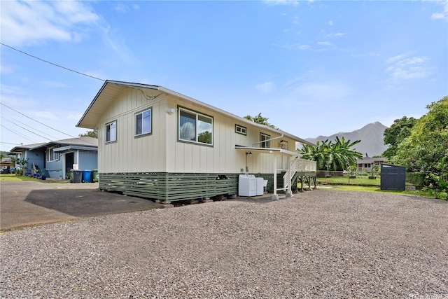 45-127 Waikapoki Rd Unit D, Kaneohe, HI 96744 - view of front of property with a mountain view and driveway
