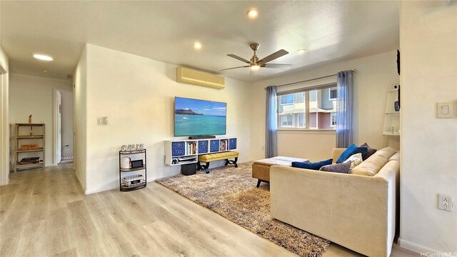 92-1145 Panana St Unit 1608, Kapolei, HI 96707 - living room with ceiling fan, a wall mounted AC, wood finished floors, baseboards, and recessed lighting