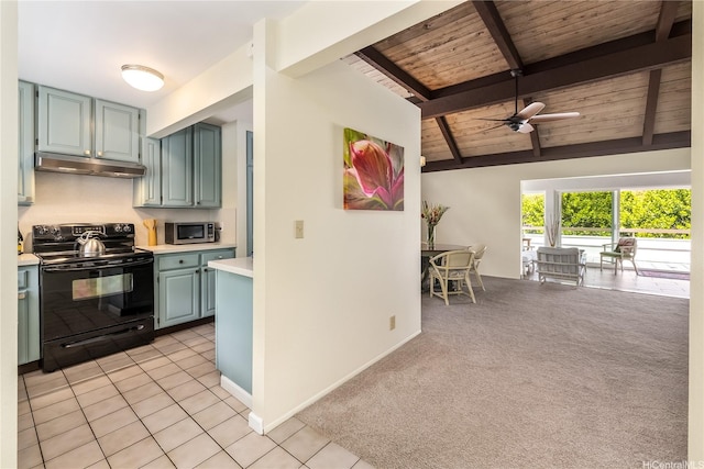 44-1303 Kou Pl Unit 1103, Kaneohe, HI 96744 - kitchen with light countertops, stainless steel microwave, black range with electric cooktop, under cabinet range hood, and wood ceiling