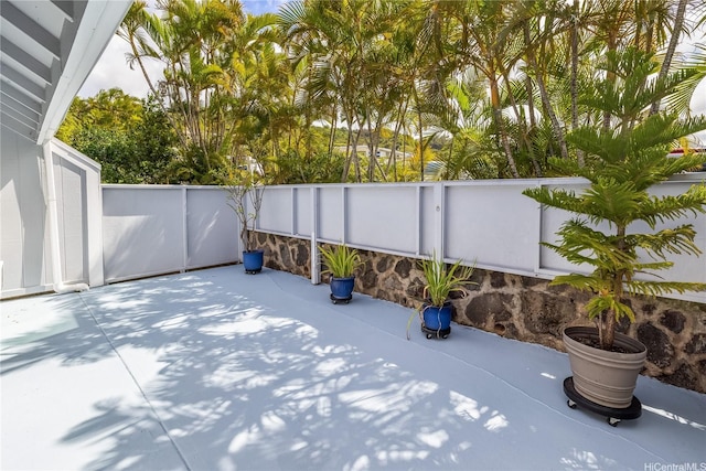 44-1303 Kou Pl Unit 1103, Kaneohe, HI 96744 - view of patio featuring a fenced backyard
